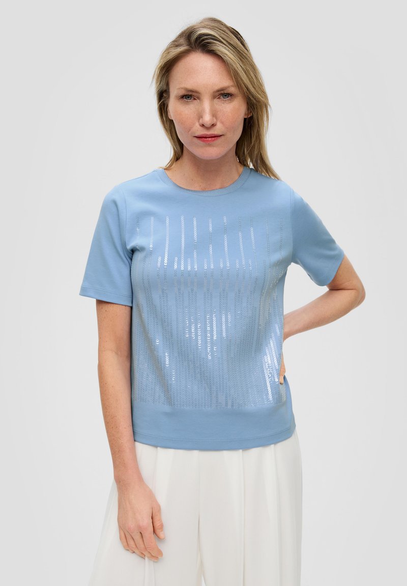 Light blue short-sleeve t-shirt with a sequined vertical stripe design on the front, featuring a round neckline and a solid bottom hem.