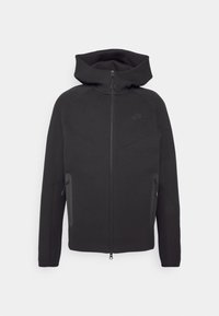 Svart zip-up hoodie med hög krage, i ett slätt material, med dragkedja framtill, två sidofickor och en liten logotyp på bröstet.