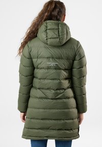 Olive green puffer coat with a hood, featuring a quilted design, a logo at the back, and long sleeves. Smooth texture and mid-length cut.