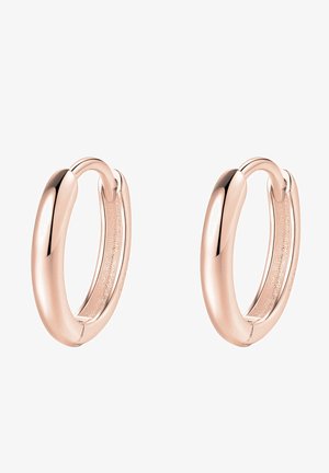 Boucles d'oreilles créoles en or rose avec un design lisse et arrondi. Extérieur poli avec un intérieur texturé pour plus de détail.