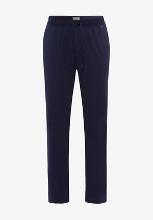 Mørkeblå sweatpants lavet af blødt stof med snøre i taljen. Har lige ben og en subtil tekstur for komfort.