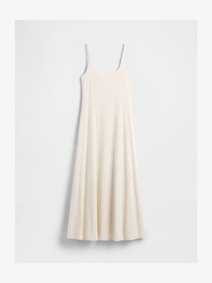 Long, cream-colored sleeveless dress with thin straps and a flared hem, laid flat against a white background.