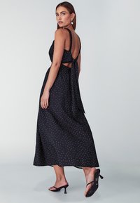 WILLA LILIANA - Maxi-jurk - black based dot
