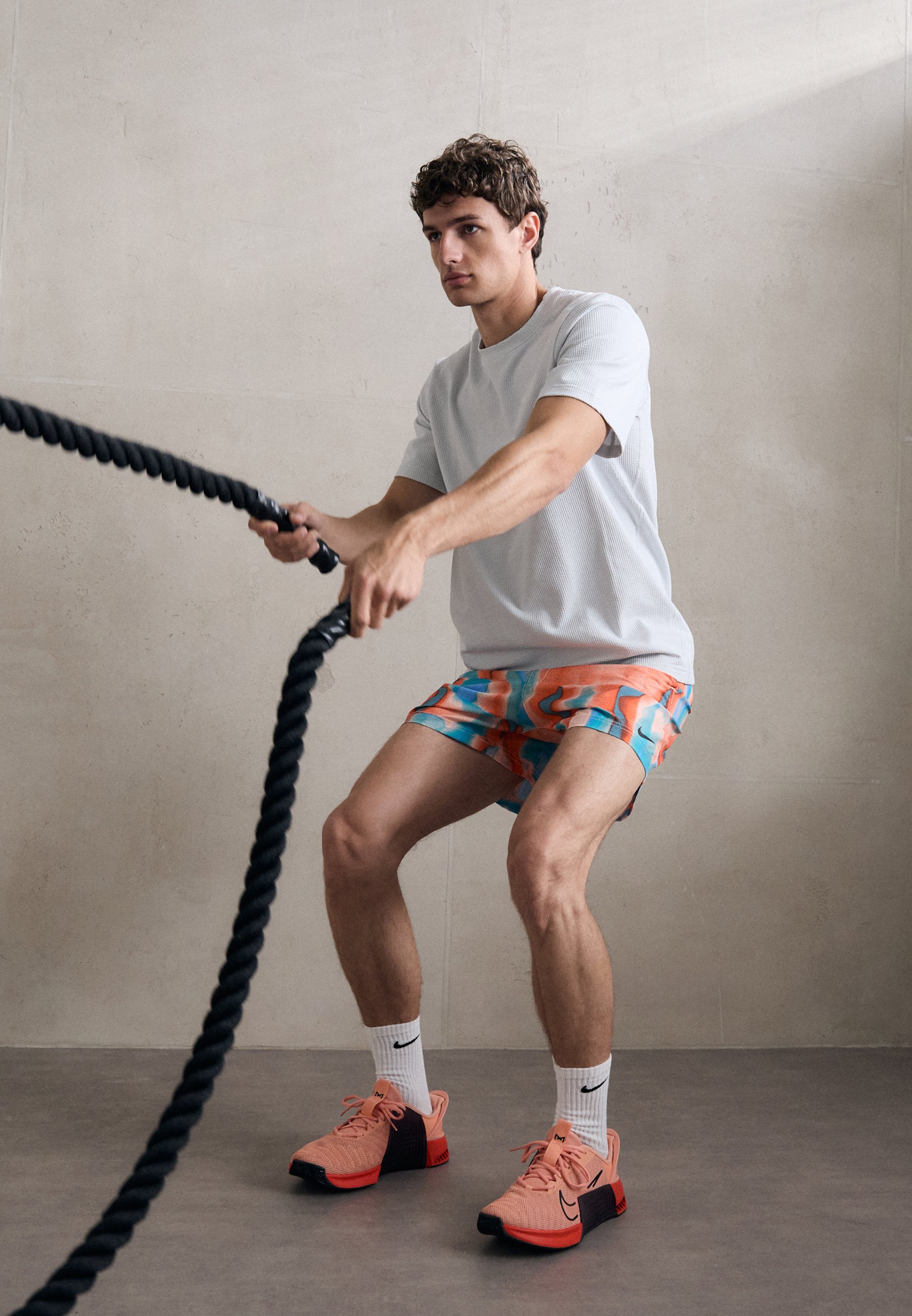 nike woven shorts coral