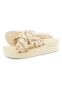 Woven flip-flop sandals in beige tones with a textured platform sole, featuring crisscross straps and a smooth footbed.