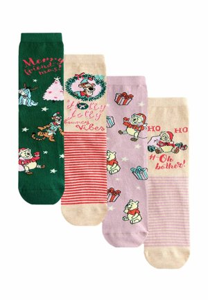Four pairs of socks: green with festive characters, cream with a wreath, pink with gifts, and striped accents, all in soft cotton blend.