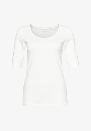 Witte lange mouw top gemaakt van zachte katoen. Heeft een ronde halslijn en een getailleerde pasvorm met 3/4 mouwen. Eenvoudig, naadloos ontwerp.