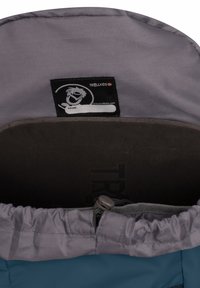 Gray fabric interior with a black tag displaying a logo and a blank name area. Outer material is blue, featuring a cinched top closure.