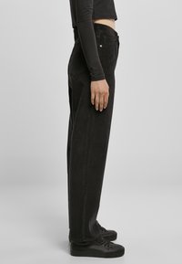 Urban Classics LADIES HIGH WAIST 90´S WIDE LEG CORDUROY PANTS - Kalhoty - black