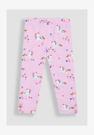 Heledad roosa retuusid elastse vööga, millel on ükssarvade muster ja värvilised lilled. Alläär on kaunistatud kahe dekoratiivse nööbiga.