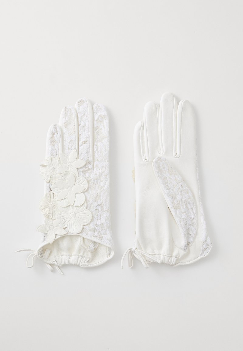 White gloves made of lace and leather, featuring floral appliqués on the left glove and a smooth leather patch on the right. Elasticated cuffs.
