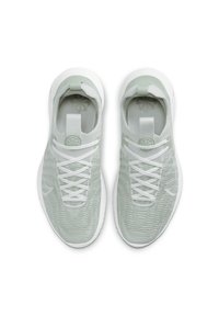 Light green athletic shoes with a textured knit upper, white laces, and rubber soles. Features a circular logo on the tongue and pull tab.