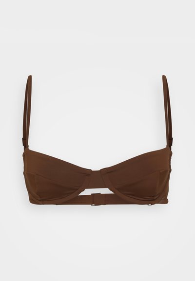 Brown bikini top with a structured design, featuring padded cups, adjustable straps, and a central band for support and comfort.