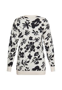 Maglione a fantasia floreale crema con disegni neri, maniche lunghe e polsini a costine. Presenta una vestibilità rilassata e una texture morbida.