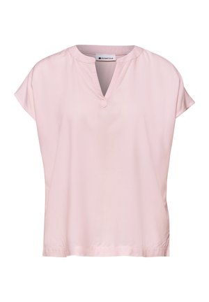 Lichtroze blouse met korte mouwen, een ronde halslijn en een V-vormige inkeping middenvoor.