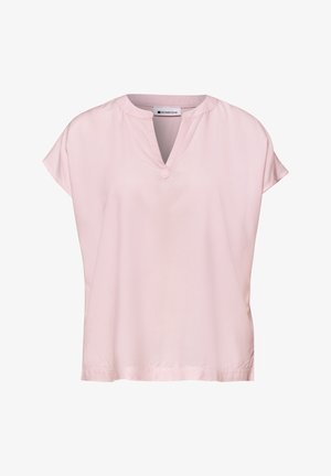 Lichtroze blouse met korte mouwen, een ronde halslijn en een V-vormige inkeping middenvoor.