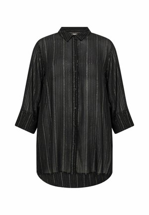 Mustvalge nuppudega särk, millel on kolmeveeranditega varrukad. Läbipaistev kangas, millel on metallilised vertikaalsed triibud ja ümar serv. Klassikaline krae disain.