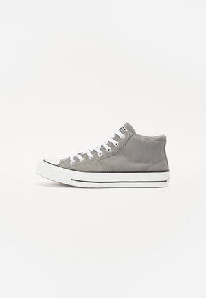 Gray canvas high-top sneakers with white laces, a rubber toe cap, and black and white striped sole, featuring a smooth texture and minimal design.