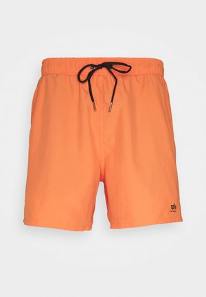 Oranžiniai maudymosi šortai su elastinga juosta, juodu raišteliu ir logotipo spauda. Pagaminti iš lengvo neilono. Paprastas dizainas, be raštų.