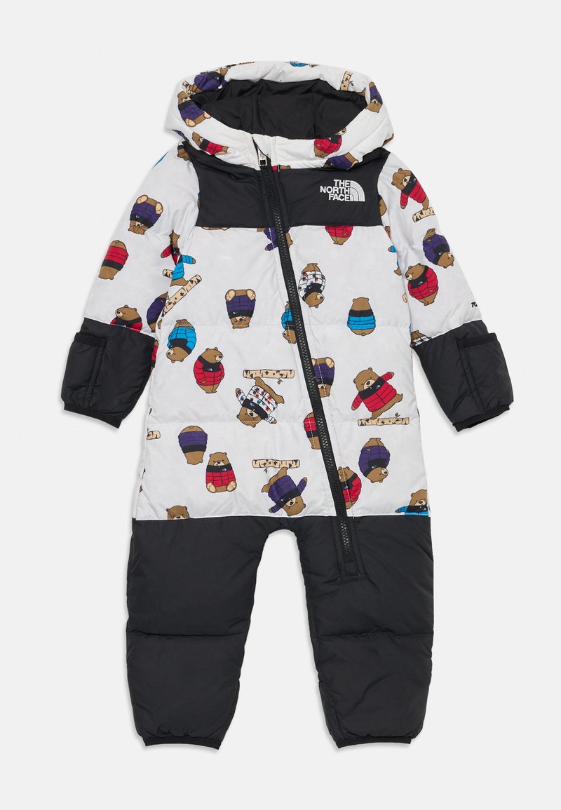 Eén-delige sneeuwpak voor kinderen met capuchon, zwarte onderkant en mouwen, witte bovenkant met een patroon van beren in kleurrijke jassen.