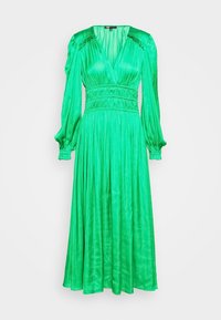 Robe midi verte à manches longues avec col en V, taille froncée, épaules bouffantes et détails à volants sur le devant et les poignets.