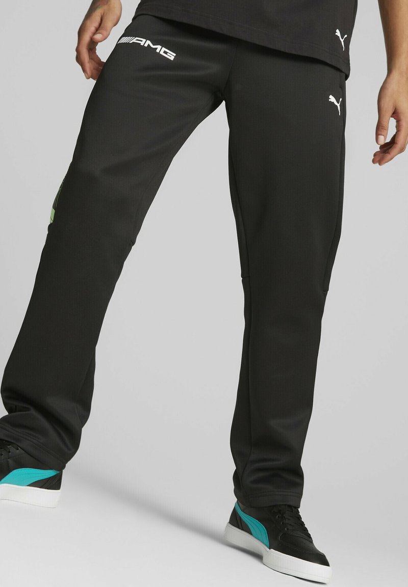 Puma MERCEDESAMG PETRONAS MOTORSPORT MT7 Tracksuit bottoms black Zalando.de