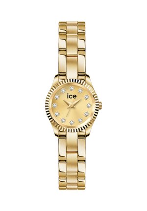 Zlaté náramkové hodinky s okrúhlym ciferníkom, krištáľovými hodinovými značkami, zlatými ručičkami, ryhovanou lunetou a kovovým pásikom, názov značky „ice“ na ciferníku.