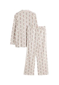 Blomstermønstrede pyjamas sæt med en kravebutton-op skjorte og bukser med elastisk talje i blød bomuld med en hvid og pastelfarvet farveskala.