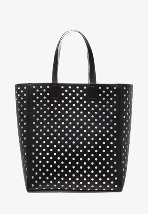 Sac cabas noir avec deux poignées et un motif de trous blancs ronds espacés uniformément couvrant sa surface.