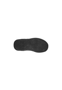 Suela de zapato de goma negra que presenta un patrón texturizado con diseños circulares y en forma de ola, que proporciona tracción y durabilidad.