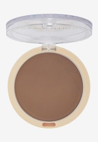 Bronzer rotondo in un compatto trasparente in plastica e crema. Polvere marrone liscia e opaca con una leggera lucentezza. Coperchio con cerniera per un facile accesso.