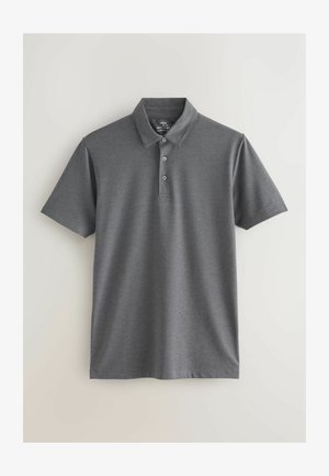 Grijze polo in een muscle fit stijl, gemaakt van zacht katoen. Heeft een kraag, een drieknopenpiek, en korte mouwen.