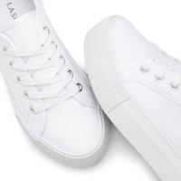 Valged kanvas tennisekad padriseedega, hõbedaste silmadega, kummist tallaga ja tekstuurse külgseina. Ümmargune varvas ja minimalistlik esteetika.