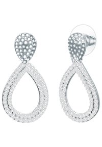 Silver tejpadsörhängen med texturerad yta och upphöjda cirkulära detaljer, fästa på en clip med genomskinlig baksida.