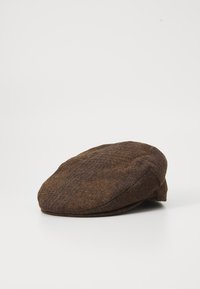 Brown wool flat cap with a rounded shape, featuring a textured surface and a slightly raised brim. Minimalist design with no visible hardware.