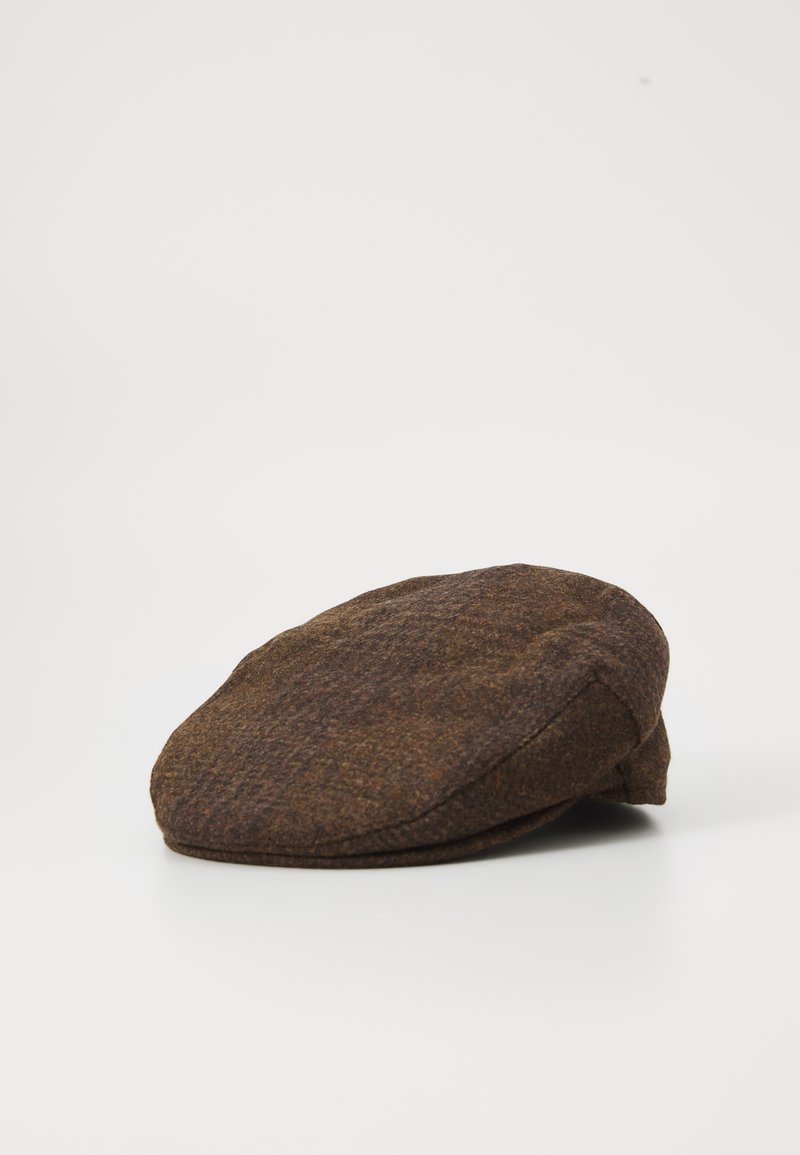 Brown wool flat cap with a rounded shape, featuring a textured surface and a slightly raised brim. Minimalist design with no visible hardware.