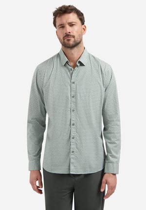 Heren overhemd met lange mouwen in lichtgroen met een patterndesign. Voorzien van een knoopsluiting aan de voorkant en een klassieke kraag. Zachte stoffen textuur.