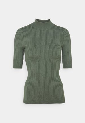 Haut ajusté en maille côtelée vert olive avec manches courtes et col montant, conçu pour la mode féminine.