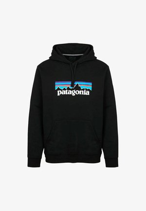 Felpa nera in cotone con tasca a marsupio anteriore, cappuccio con coulisse regolabile e un logo Patagonia colorato con grafica di montagna.