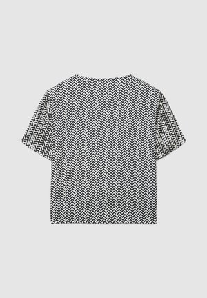 T-shirt a maniche corte corta con motivo a zigzag bianco e nero. Realizzata in tessuto leggero, con vestibilità comoda e scollo rotondo.
