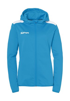 Veste à capuche bleu avec fermeture éclair à l'avant, accents blancs sur les épaules et le logo "Kempa" sur la gauche de la poitrine. Tissu lisse et léger.