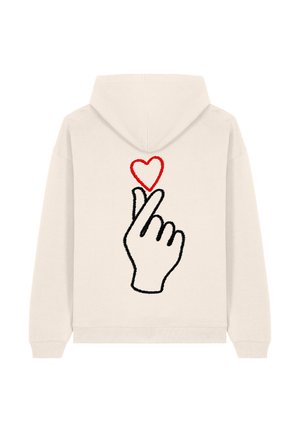 Felpa crema con un design ricamato che rappresenta una mano che fa un gesto a forma di cuore, con un cuore rosso sopra. Tessuto morbido, taglio rilassato.