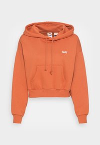 Cropped orange hoodie in soft fabric with a front pocket, adjustable drawstrings, and white Levi's logo on the chest.