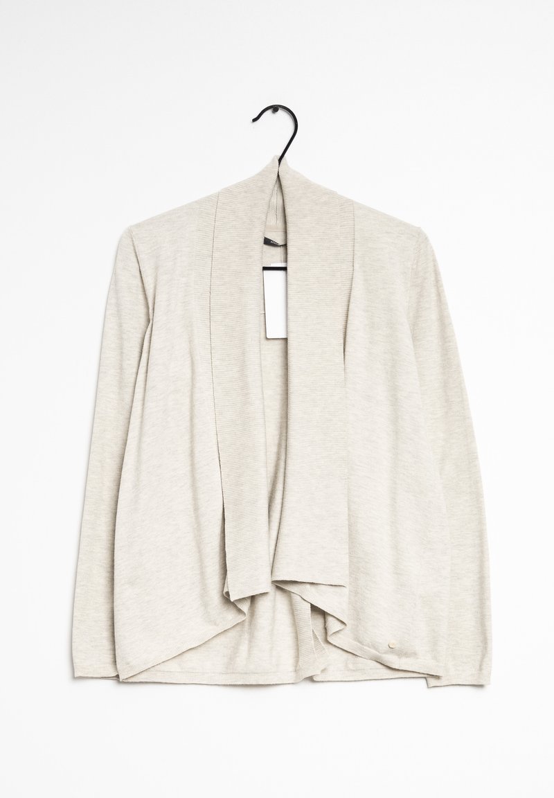 Cardigan beige realizzato in morbido tessuto a maglia, caratterizzato da un'apertura frontale, maniche lunghe e un orlo posteriore più lungo. Sottile texture a costine.