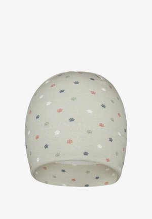 Green knitted beanie with small, colorful paw prints in pink, white, blue, and green. Rounded shape with a soft texture and rolled hem.