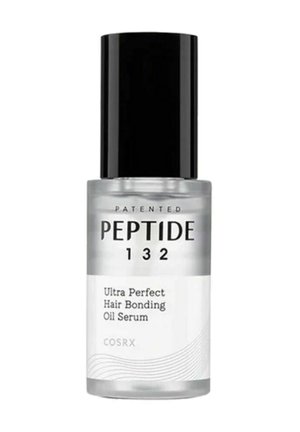 Flacon transparent de COSRX Peptide 132 Ultra Perfect Hair Bonding Oil Serum avec bouchon noir et étiquette blanche affichant le nom et les détails du produit.
