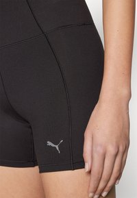 Puma STUDIO FOUNDATIONS BIKER  - Tajice - black