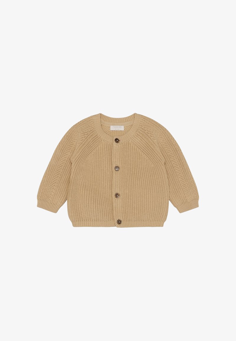 Beige knitted cardigan with ribbed texture, round neckline, and three brown button closures. Features long sleeves and a relaxed fit.