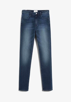 Tmavě modré džíny s úzkým střihem, pěti kapsami, jemným vyblednutím a mírným opotřebením. Obsahují zapínání na knoflík a poutka na pásek.