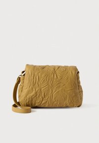 Leather crossbody bag in mustard yellow with embossed floral pattern, rectangular shape, and adjustable strap. Textured surface detail.